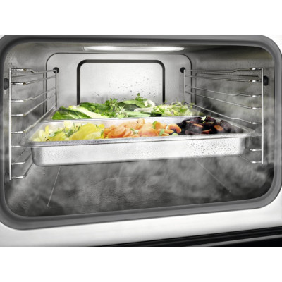 Компактный духовой шкаф с функцией пароварки и микроволновым режимом Miele DGM 7440 CLST